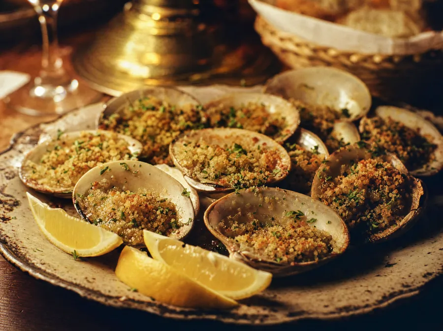 Baked clams oreganate on the half shell